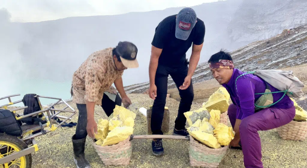 Sulfur miners carrying baskets at Kawah Ijen